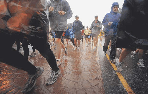 The second wave of Pikes Peak Ascent runners got off to a wet start Saturday in downtown Manitou Springs. More than half the field didn’t finish the 13.32 mile race—either by their own choice or because officials turned them back because of bad weather above treeline.