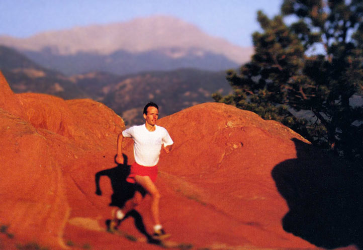 Matt Carpenter runs in the Garden of the Gods near his home in Manitou Springs, Colorado, with his beloved Pikes Peak in the background.