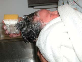 Kyla gets her first shampoo