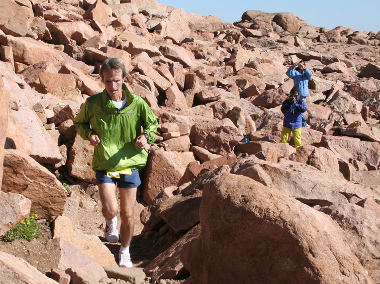With photographers clicking away, Matt Carpenter heads up Pikes Peak Sunday to complete his dual victory. Carpenter is the only person to have ever won both the Pikes Peak Ascent and the Pikes Peak Marathon in the same year. Saturday's and Sunday's wins were the second time the 43-year old Manitou resident has pulled off the highly improbable double. Carpenter holds the course and age group records in both events and won the Marathon last year.